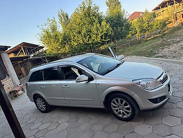 кузов е39: Opel Astra: 2013 г., Механика, Бензин, Универсал — 5