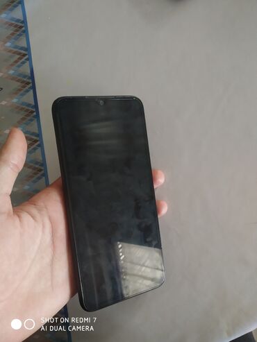 телефон fly bl9012: Xiaomi Redmi 9C, 64 ГБ, цвет - Черный, 
 Отпечаток пальца, Face ID