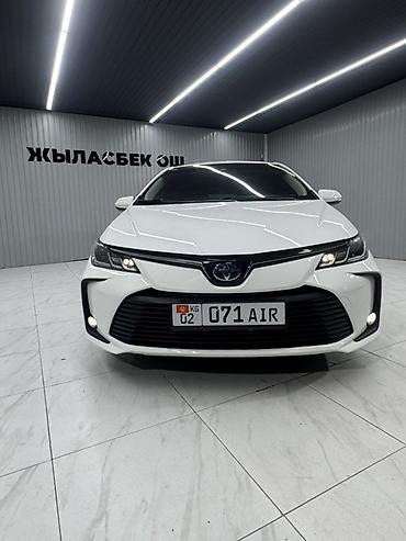 приус 2024: Toyota Corolla: 2022 г., Гибрид, Седан — 7