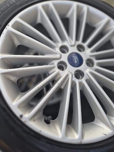 фургоны категории б: Ford üçün orijinal yüngül lehimli disklər və təkər komplekti - — 5