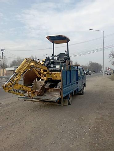 Аренда экскаватора: Мини-экскаватор Komatsu PC09-1 с доставкой на объект порадую портери — 4