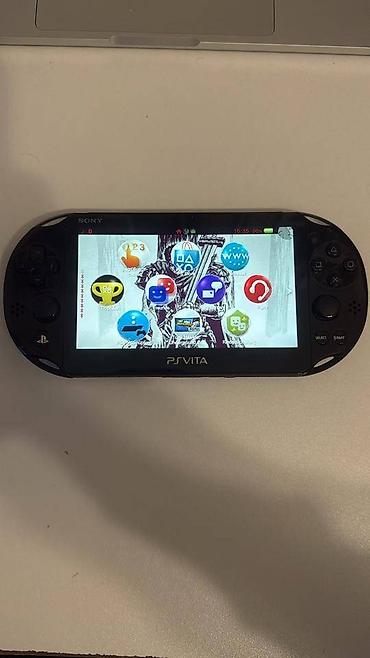 PS Vita (Sony Playstation Vita): Playstation vita ideal veziyyetdedir. Hec bir problemi yoxdu. Ciziqi — 7