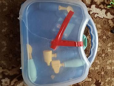 Игрушки: Чемоданчик медика-50 сом, динозавры - 50 сом, игра рыбки, нет — 2