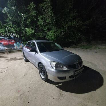 Mitsubishi: Mitsubishi Lancer: 2004 г., 1.3 л, Механика, Бензин, Седан