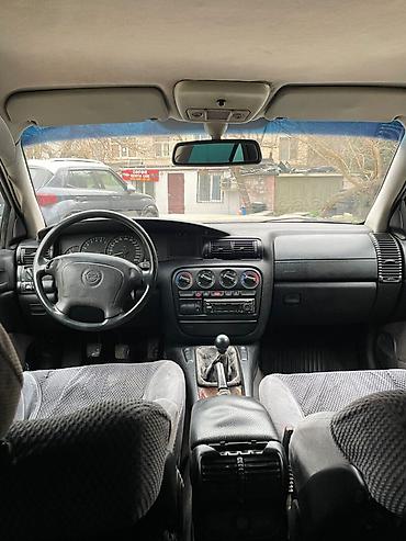 opel omega: Opel Omega: 2.5 l | 1994 il Sedan — 6