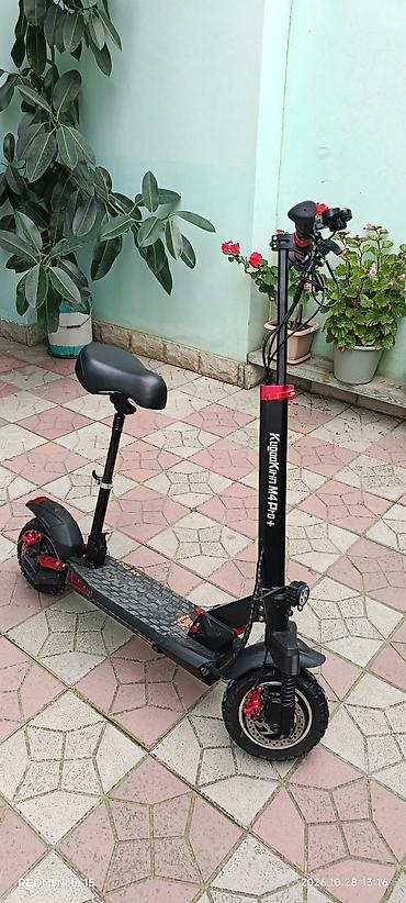 mikrafon şur: **KugooKirin M4 Pro+ elektrik skuter** Cəmi 17 km məsafə qət edib — 4
