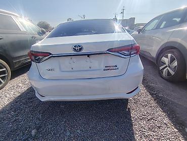 prius 2005: Toyota Corolla: 2021 г., 1.8 л, Вариатор, Гибрид, Седан — 2