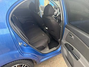 амартизаторы: Kia Rio: 2011 г., 1.4 л, Автомат, Бензин, Седан — 8