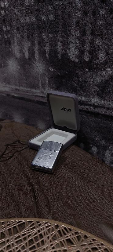 ничего: Оригинальная ZIPPO-TIGER. Хорошо работает,ничего не менялось всё — 1