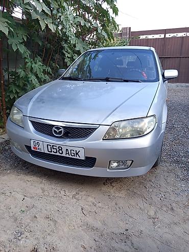 mazda premacy 1 8: Mazda Familia: 2001 г., 1.5 л, Механика, Бензин, Седан — 10