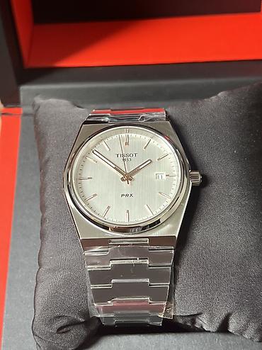 винтажное: Tissot PRX — швейцарские кварцевые часы с интегрированным стальным — 7