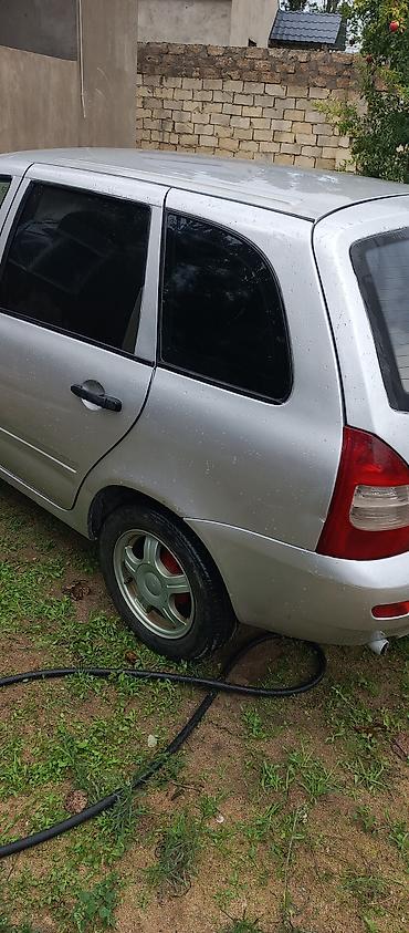 w 202 kapot: VAZ (LADA) Kalina: 1.6 l | 2010 il 220000 km Universal — 5