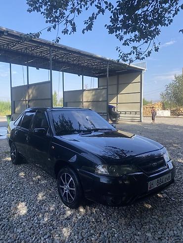 салон автомобиля: Daewoo Nexia: 2011 г., 1.5 л, Седан — 4