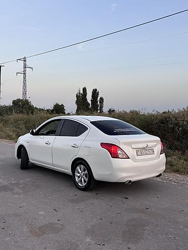 kollektor qutusu: Nissan Sunny: 1.5 l | 2013 il Sedan — 4