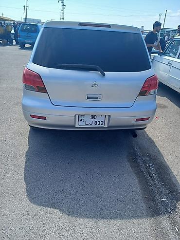 Mitsubishi: Mitsubishi Airtrek, gümüşü rəng, 5 qapılı krossover/gəzinti — 2