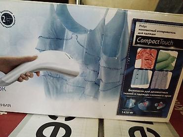 buxarli mop: Philips CompactTouch geyim buxarlandırıcısı - Model: Philips — 2