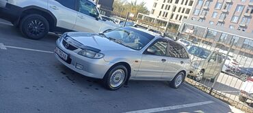 электронная скутер: Mazda 323: 2001 г., 1.3 л, Механика, Бензин, Хетчбек