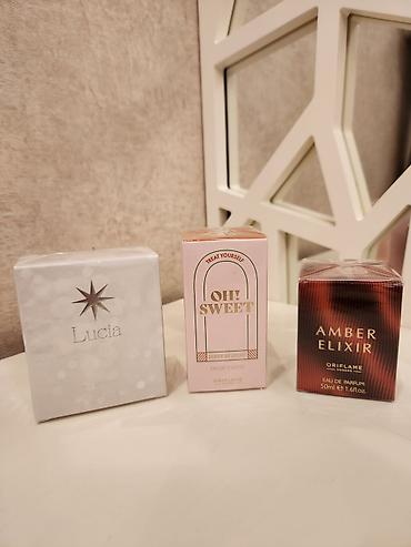 Oriflame məhsulları – ətirlər, bədən baxımı və dezodorant dəsti -