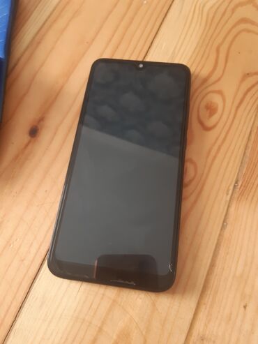 mobil telefonlar kredit: Xiaomi Redmi 7, 32 ГБ, цвет - Красный, 
 Отпечаток пальца