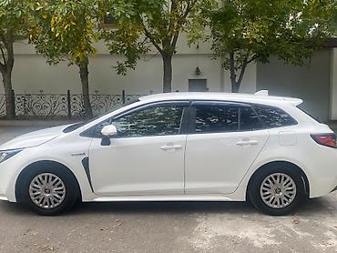 toyota bakı: Toyota Corolla Touring Sports Hybrid – ağ rəngli universal kuzov — 7
