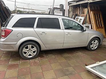 lada kalina 2008: Opel Astra Caravan (universall) – gümüşü rəng Xüsusiyyətlər: - Kuzov — 2