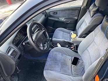 Mazda: Mazda Capella: 1997 г., 1.8 л, Механика, Бензин, Седан — 10