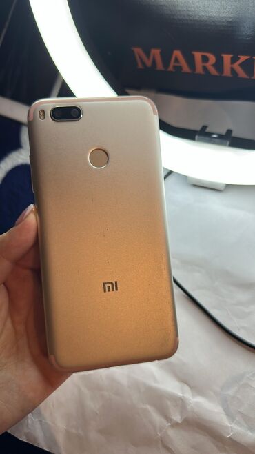 xiaomi 4a router: Xiaomi Mi A1, 64 ГБ, цвет - Золотой, 
 Сенсорный, Отпечаток пальца