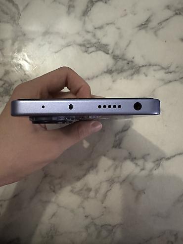 05: Xiaomi 256 GB, rəng - Bənövşəyi, 
 Barmaq izi, Face ID, Sensor — 10