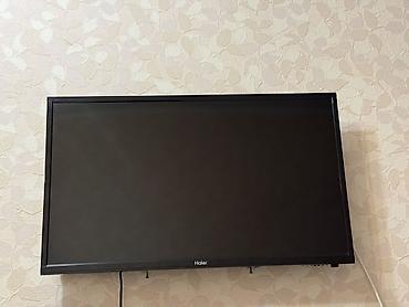 32 дюйма: Телевизор Haier, диагональ экрана ориентировочно 32–40". Плоская — 1