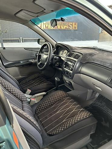 50 55: Mazda 323: 2001 г., 1.6 л, Автомат, Бензин, Хэтчбэк — 9