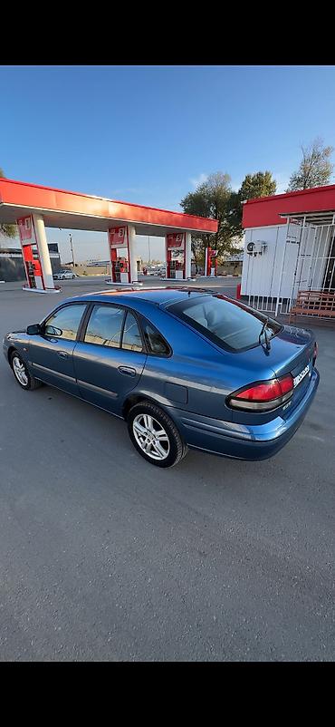 260: Mazda 626: 1997 г., 1.8 л, Механика, Бензин, Хэтчбэк — 5