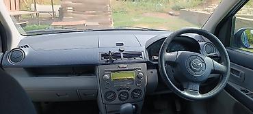 митсубиси спейс стар: Mazda Demio: 2003 г., Автомат, Бензин, Хэтчбэк — 4