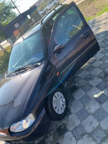 транспорте: Ford Escort: 1995 г., 1.6 л, Механика, Бензин, Универсал