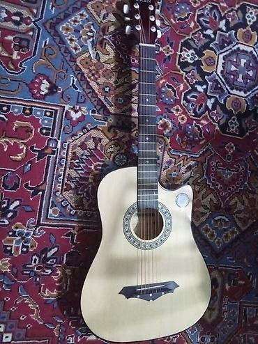elektron gitara satisi: Akuistik gitara – kəsik (cutaway) korpus dizaynı Irin 38A fermasi — 1
