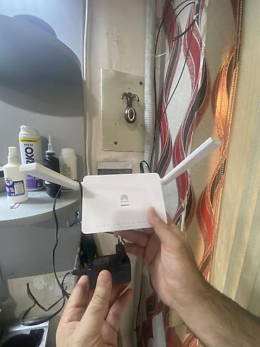 wifi adlari azeri: Huawei OptiXstar Wi‑Fi router/modem - İki antenli güclü Wi‑Fi siqnalı — 3