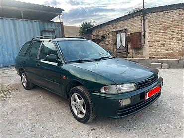 пш метр: Mitsubishi Lancer: 1999 г., 1.6 л, Кол менен иштөөчү, Бензин, Универсал — 5