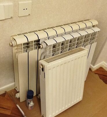 radiator isidici: Секционный Радиатор