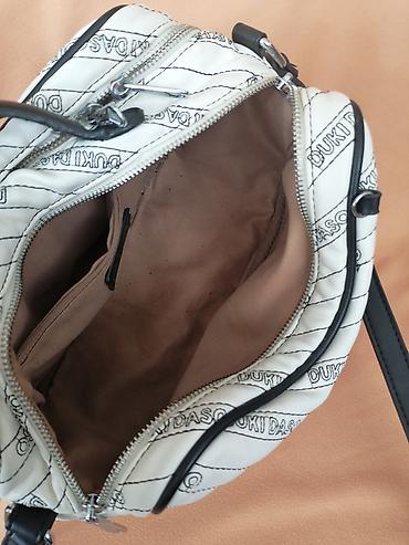 obag srbija: DUKI DASO manja tasna sa printom loga. Ima dve pregrade pa je vrlo — 7