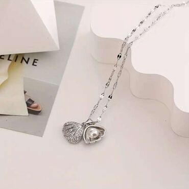 ogrlica skoljke: Pendant necklace, Cartier, Material: Stainless steel