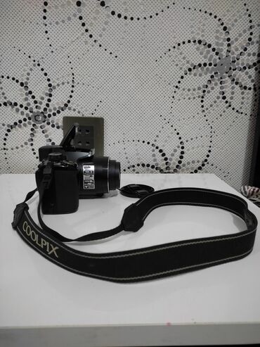 fotoapparat: Fotoapparat "Nikon", COOLPIX P100. Yaddaş kartı 4 GB. Adapter vilka