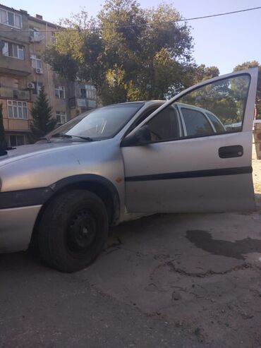 автомобиль фольксваген поло: Opel Vita: 1.4 l | 1997 il Hetçbek