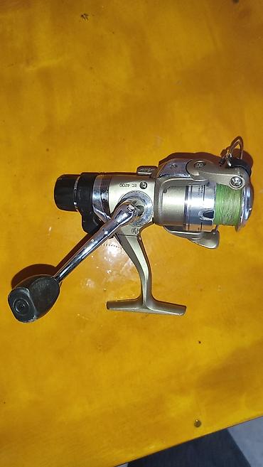 balıq toru: Balıq ovu üçün spinning katyolkası – **SPRO EC 4200** modeli. Korpus — 3