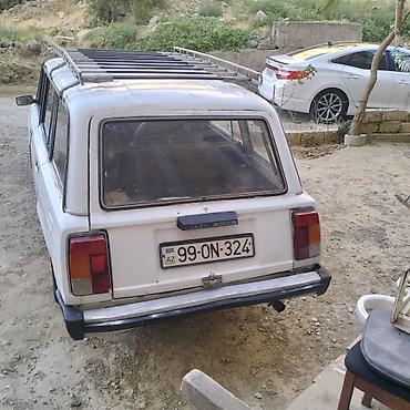 2104 baqaj: Lada 2104 universal, ağ rəng. - Kuzov: 5 qapılı universal gövdə, iri — 2