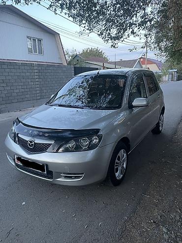Mazda Demio: 2004 г., 1.5 л, Автомат, Бензин, Хэтчбэк