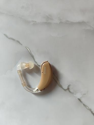 Слуховые аппараты: Слуховой аппарат Phonak Baseo Q (заушный) Комплектация: - Слуховой — 2