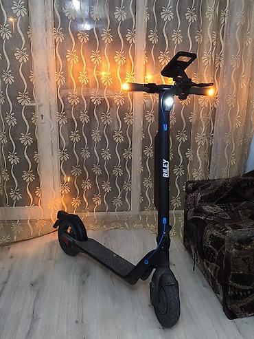 matasklet qiymetleri: Skuter Rs pro 1 suret 25 Tam dolu zaretqa ile 25 km yol gedir Ela — 1