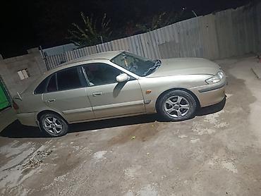 Mazda: Mazda 626: 2001 г., Седан — 4