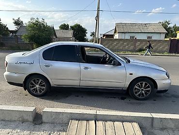 керме тоо: Nissan Primera: 1999 г., Кол менен иштөөчү, Бензин, Седан — 6