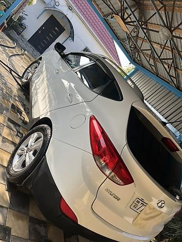 premier hazard siren: Hyundai ix35 – ağ rəngli, şəhər və uzun məsafələr üçün rahat — 7