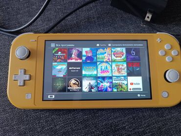 Nintendo Switch: Nintendo Switch Lite + 25 Oyun + 128 GB Kart Nintendo Switch Lite